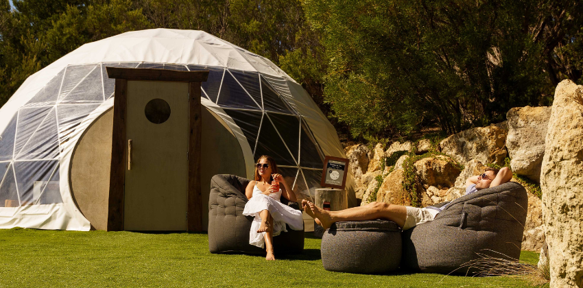 couple hanging outdoors with Ambient lounge designer sets