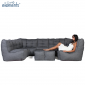 Woman lounging on a mod6 titanium weave lounge set from ambient lounge in new zealand