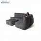 Woman lounging on a Mod5 titanium weave lounge set from Ambient lounge in New Zealand