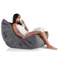 Woman lounging on a titanium weave acoustic sofa bean bag from Ambient lounge in New Zealand