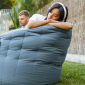 Woman sleeping on blue bean bag