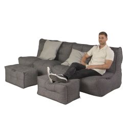 Man resting on a Mod 4 Quad Couch Titanium Weave from ambient lounge in New Zealand